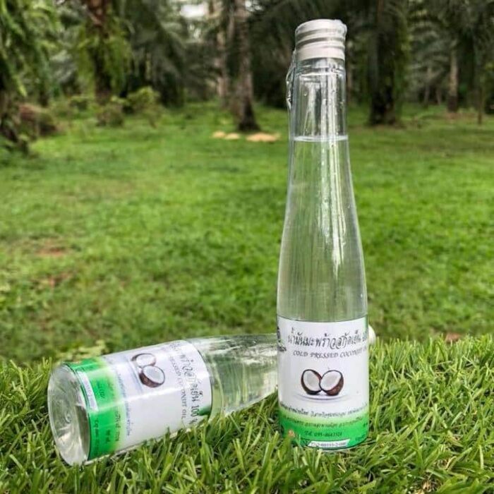 น้ำมันมะพร้าวสกัดเย็น ขนาด 100 ml ตรา 100 พันมะพร้าวไทย